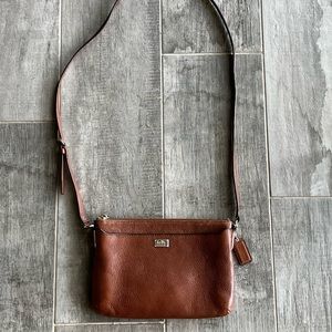 Coach brown leather crossbody purse.